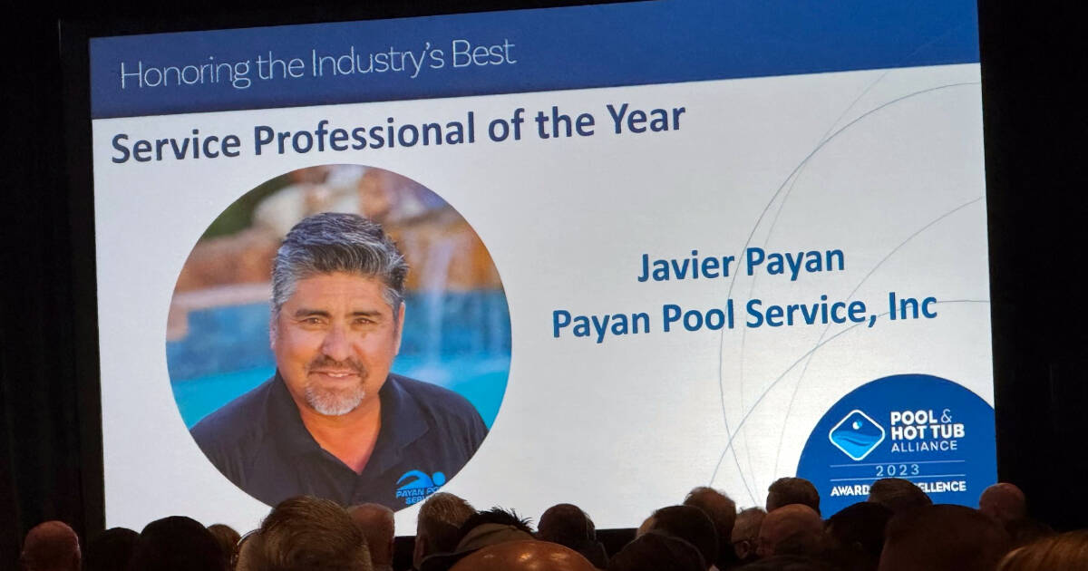 Audience view of the presentation screen announcing the Service Professional of the Year for 2023 by the Pool and Hot Tub Association (PHTA) - Javier Payan.